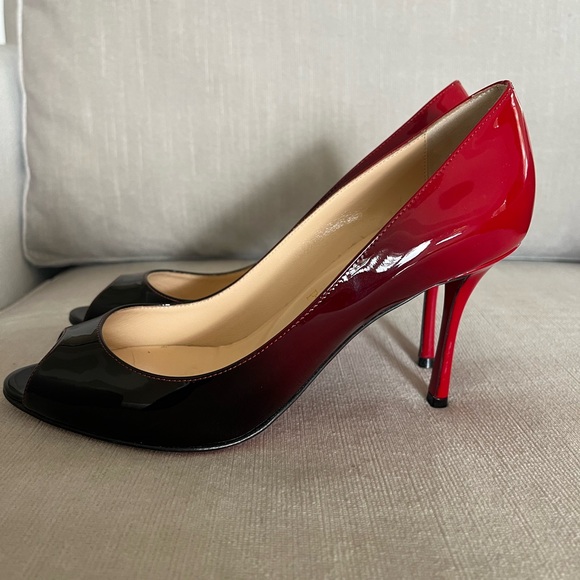 Striking Louboutin Red and Black High Heels with Peep-Toe Design - Picture 8 of 9